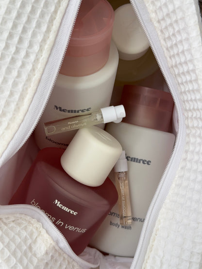 White wash bag open, revealing Memree poducts inside